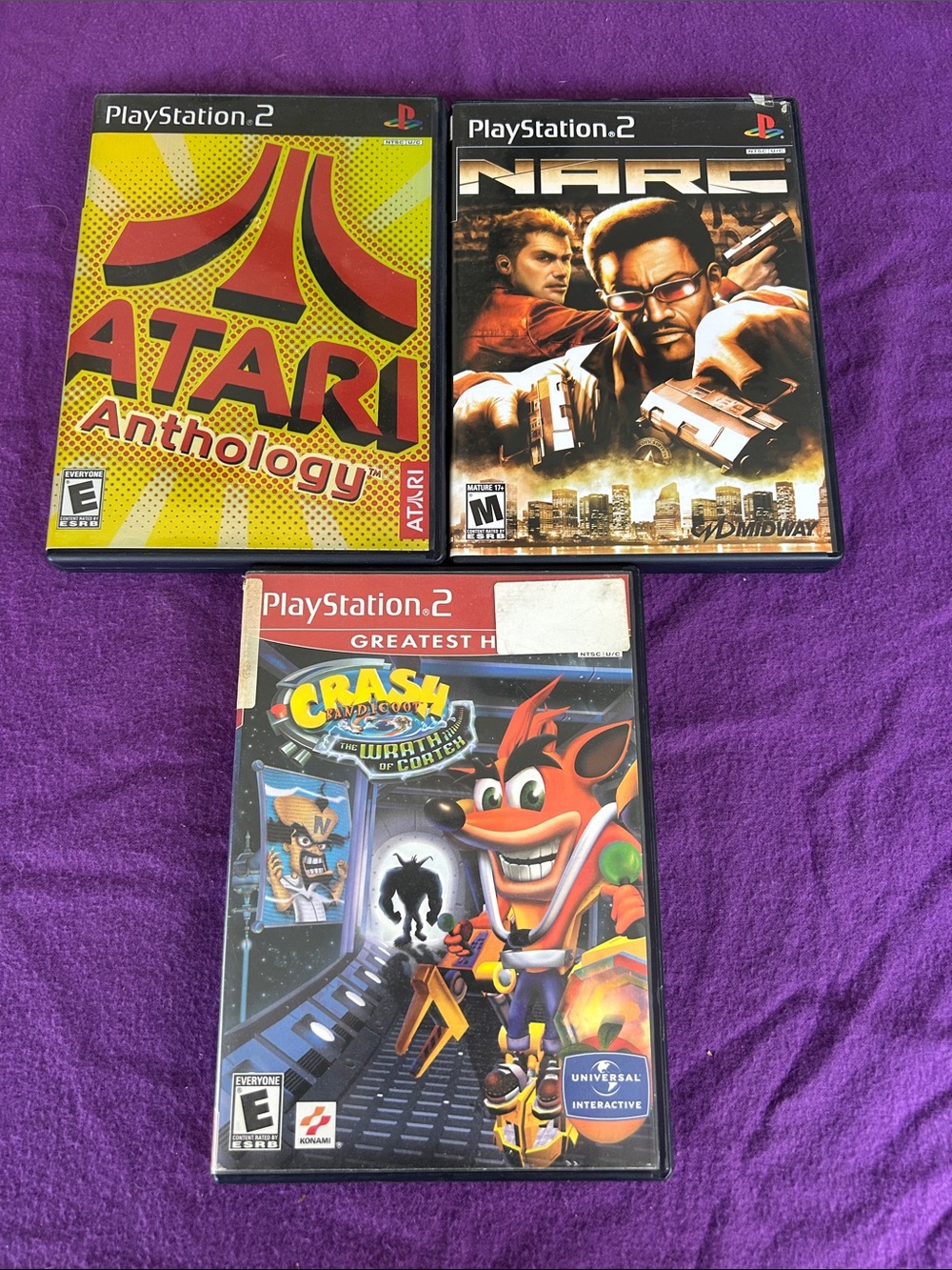 Sony PlayStation 2 Game Lot — Purple Background with Multicolor Covers